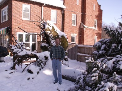 Steve standing by the root system of the pine tree, January 1, 2007.