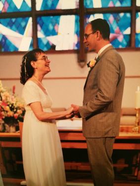 Holding hands on wedding day