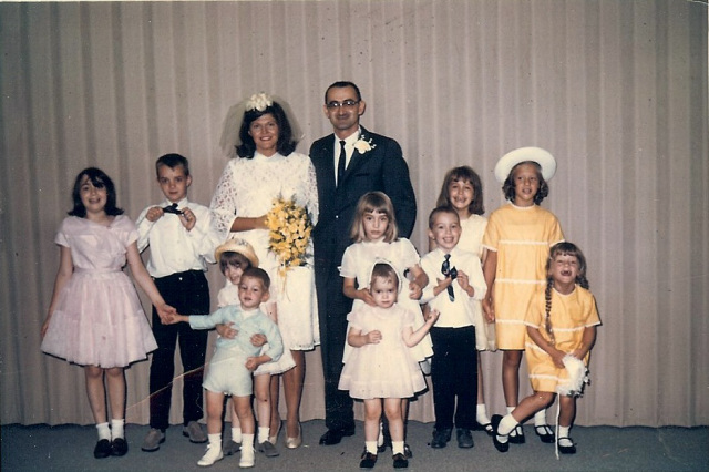 Cathy is the little girl in the front, right in the middle. Susan is keeping her in check!