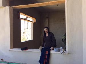 Michelline Koudmani in her Aunt' Mona's house which is currently under reconstruction.