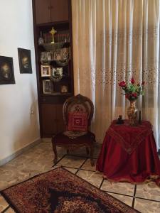 Elder Najwa's home in Homs, now fully restored. This chair is the only one of her belongings to survive ISIS, but her home is filled with the love and light of Jesus, as she lives here with here brother and sister.